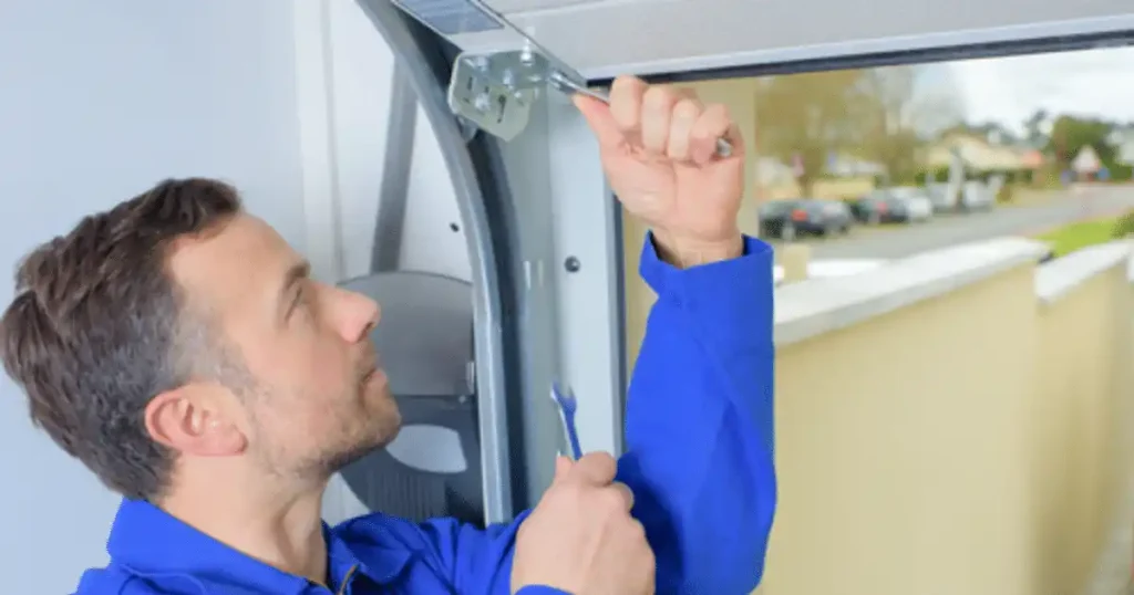 expert repairing garage door
